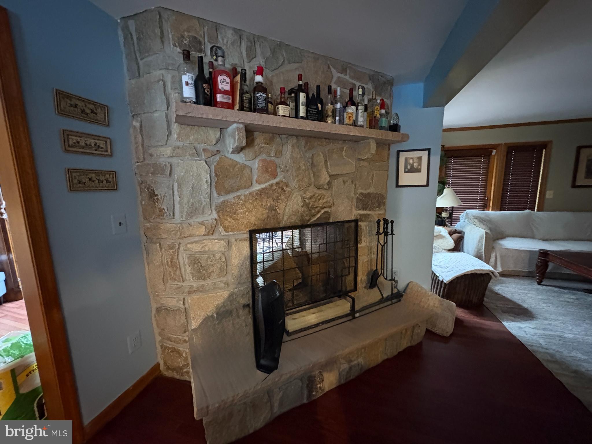 36 White Pine Road Chesterfield, NJ 08515 - Photo 20 of 33 a living room with furniture and a fireplace