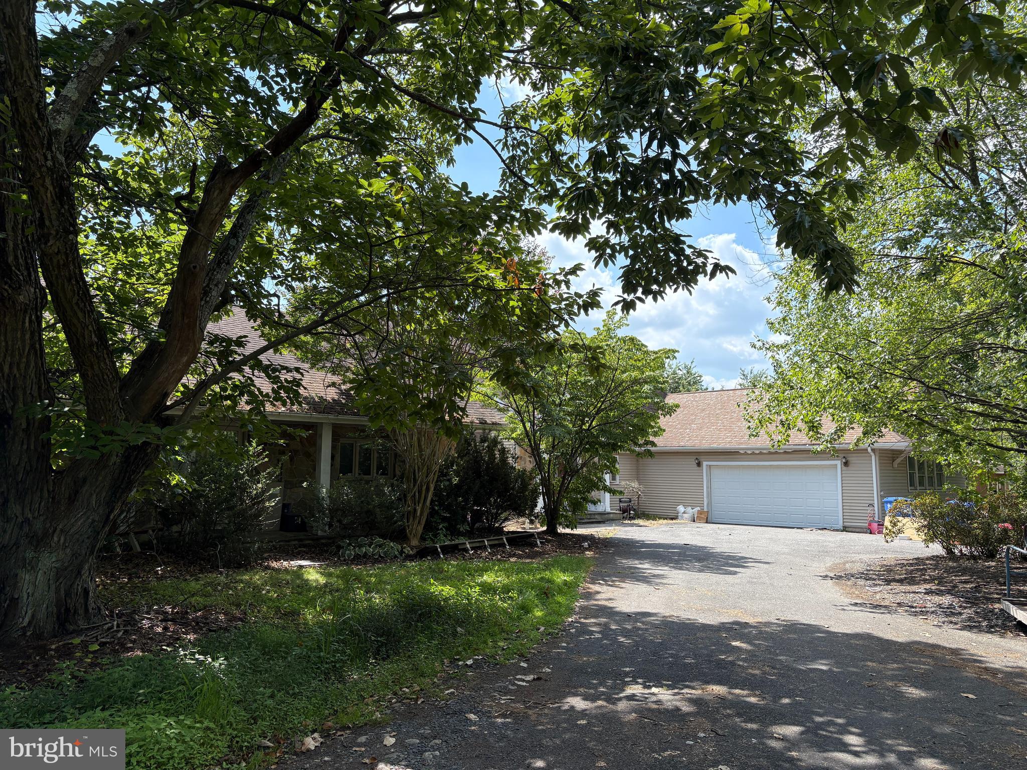 36 White Pine Road Chesterfield, NJ 08515 - Photo 30 of 33 a front view of a house with a yard and a garage