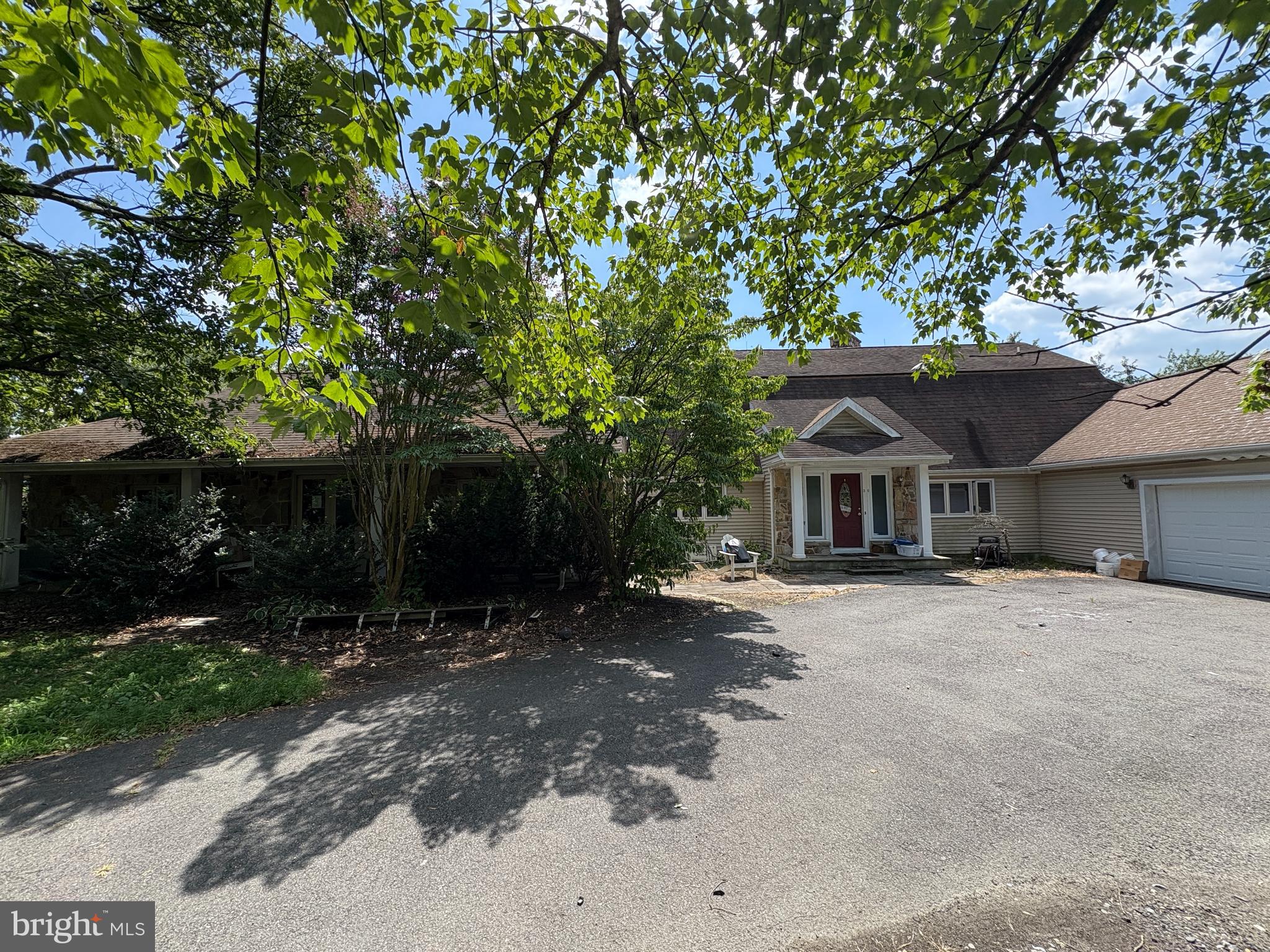 36 White Pine Road Chesterfield, NJ 08515 - Photo 32 of 33 a front view of a house with a garden