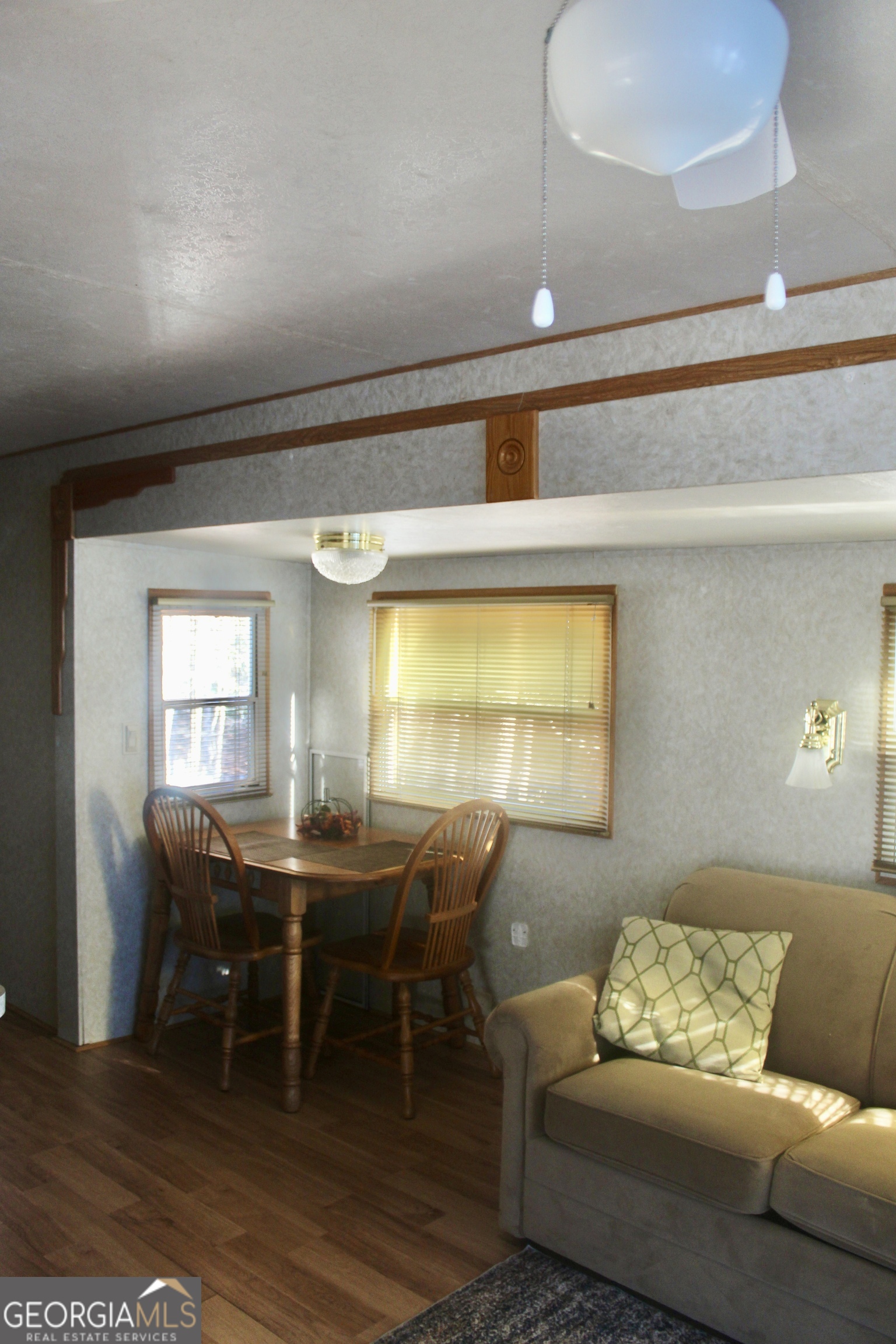 183 Holiday Loop Cleveland, GA 30528 - Photo 12 of 22 a living room with furniture and a large window
