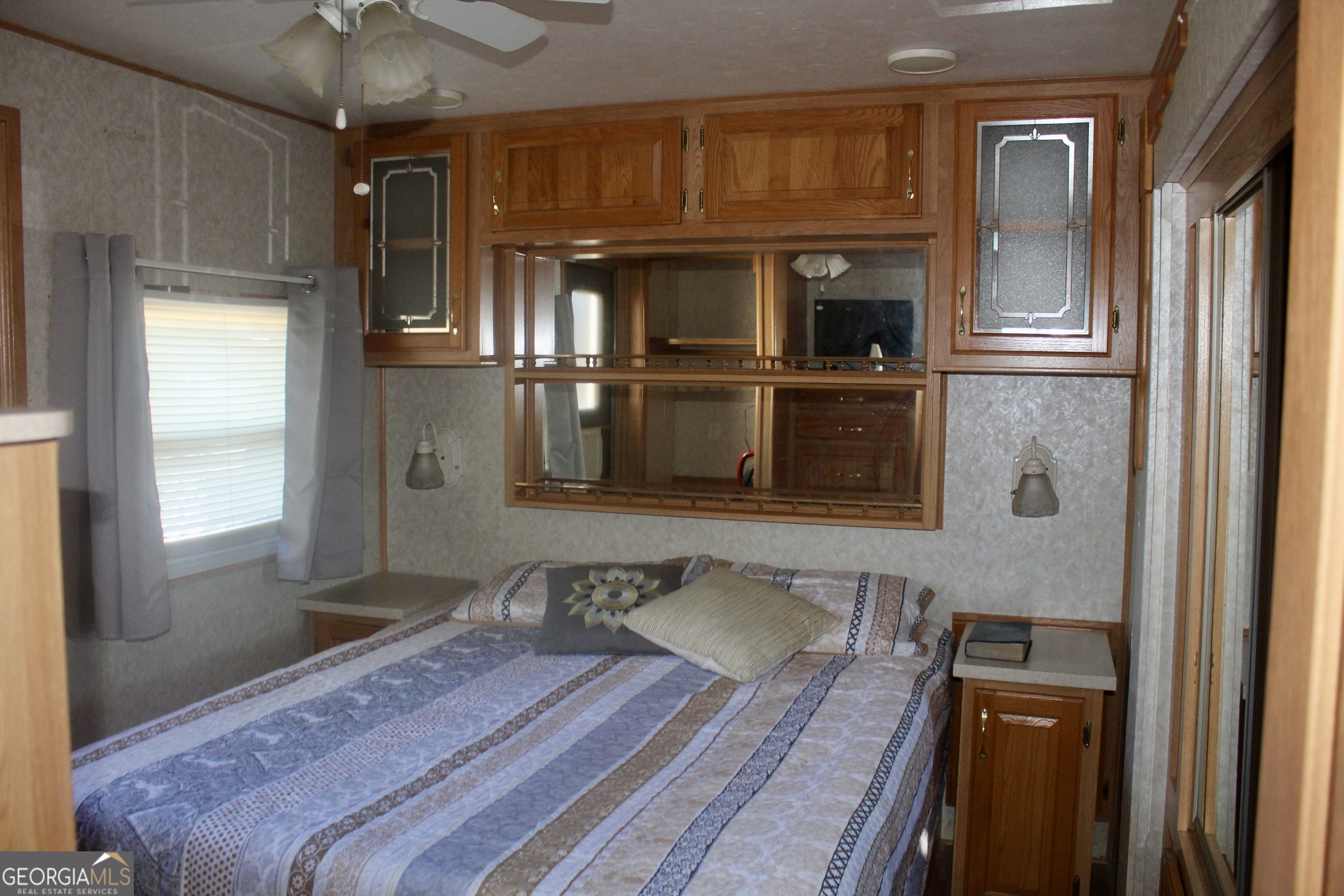183 Holiday Loop Cleveland, GA 30528 - Photo 13 of 22 a bedroom with a bed and a dresser