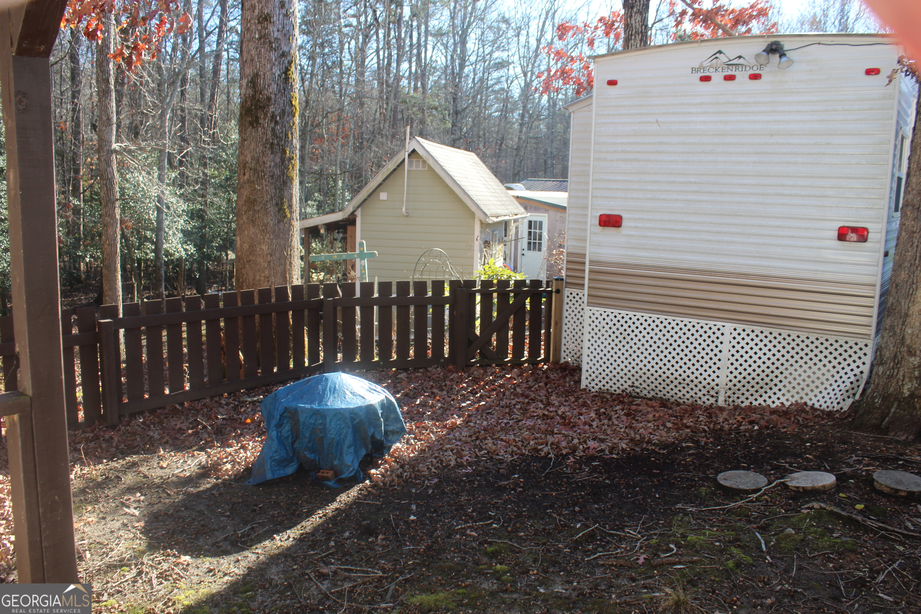 183 Holiday Loop Cleveland, GA 30528 - Photo 21 of 22 a view of a house with a yard