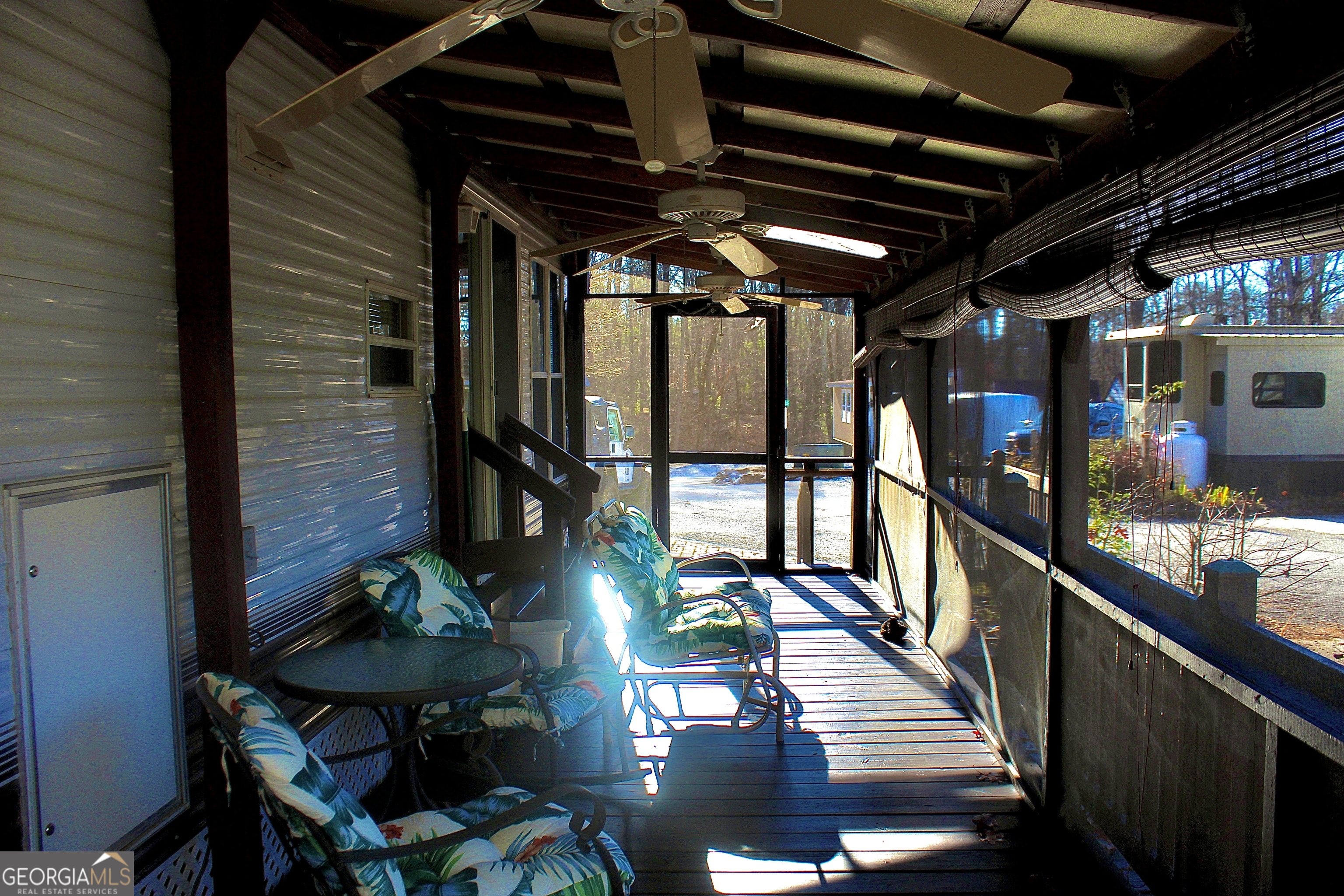 183 Holiday Loop Cleveland, GA 30528 - Photo 5 of 22 a view of a porch with furniture