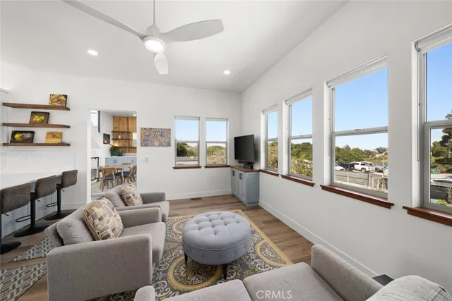 a kitchen with a sink a window and stainless steel appliances