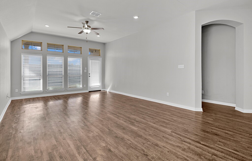 10624 Langham Drive Waco, TX 76708 - Photo 6 of 40 wooden floor in an empty room with a window