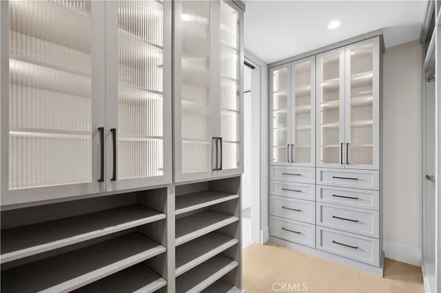 a bedroom with bed and window