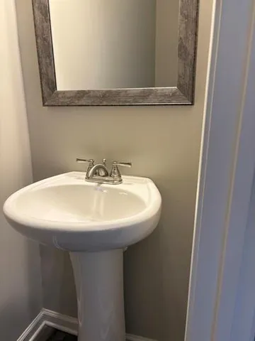 a sink with a mirror