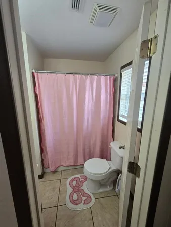 a bathroom with a sink and toilet