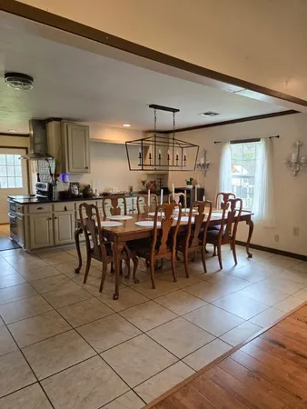 a group of people sitting at tables in a room
