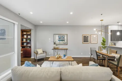 a living room with furniture and a couch