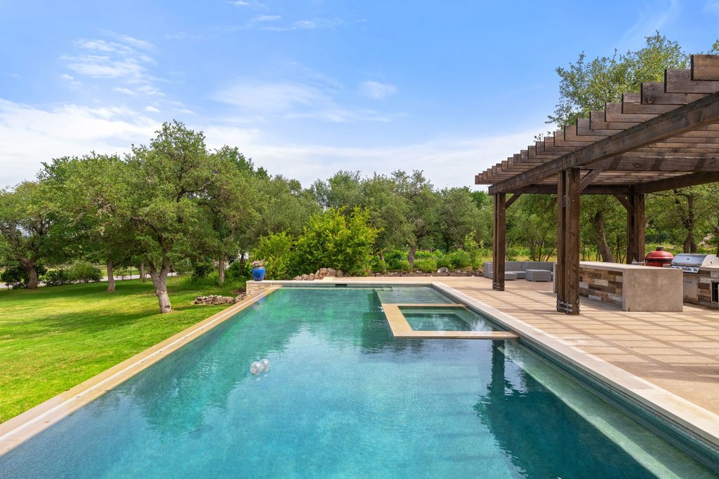 11002 Foundation Road Austin, TX 78726 - Photo 5 of 40 a view of a backyard with swimming pool