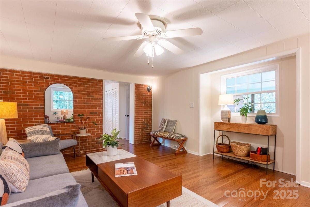 609 West Probart Street Brevard, NC 28712 - Photo 12 of 38 a living room with furniture and a fireplace