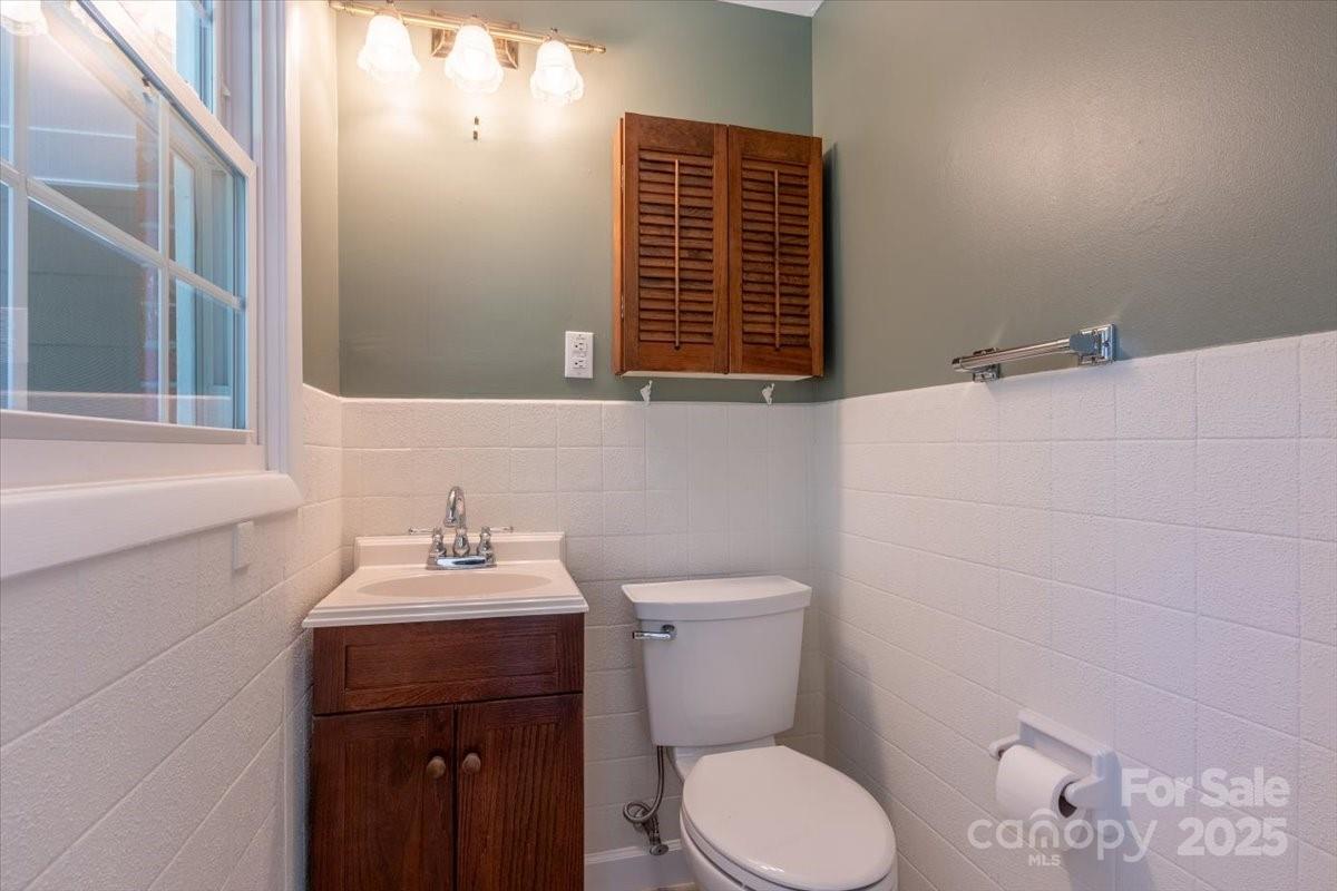 609 West Probart Street Brevard, NC 28712 - Photo 20 of 38 a bathroom with a sink and a toilet