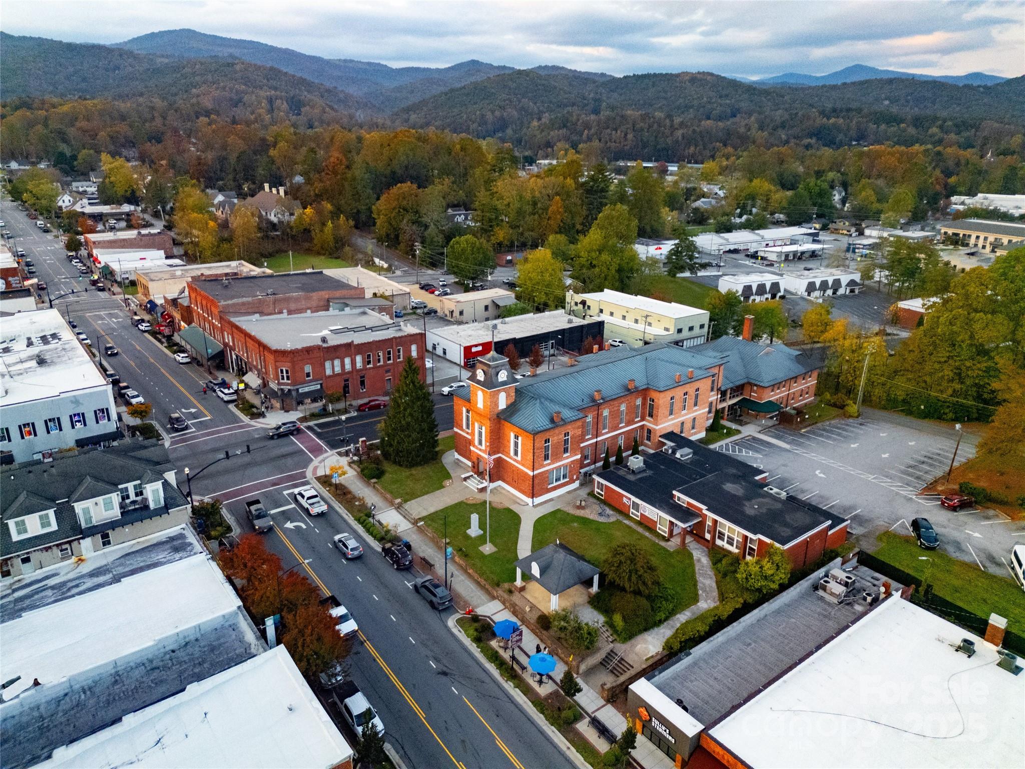 609 West Probart Street Brevard, NC 28712 - Photo 33 of 38 an aerial view of residential houses with outdoor space