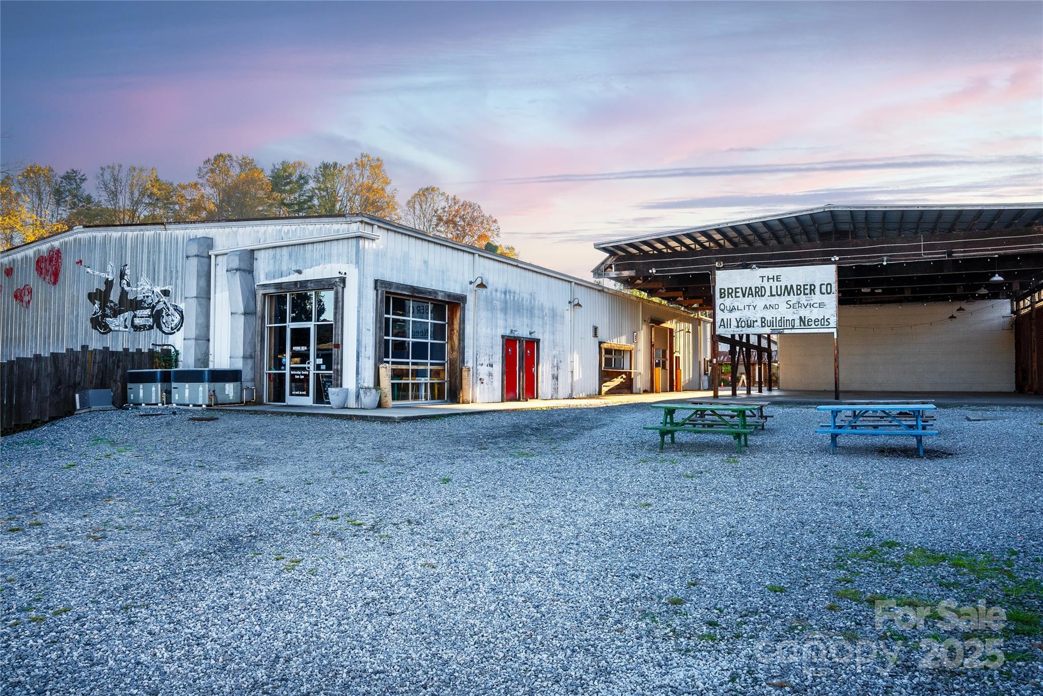 609 West Probart Street Brevard, NC 28712 - Photo 35 of 38 a view of a house with a backyard and porch
