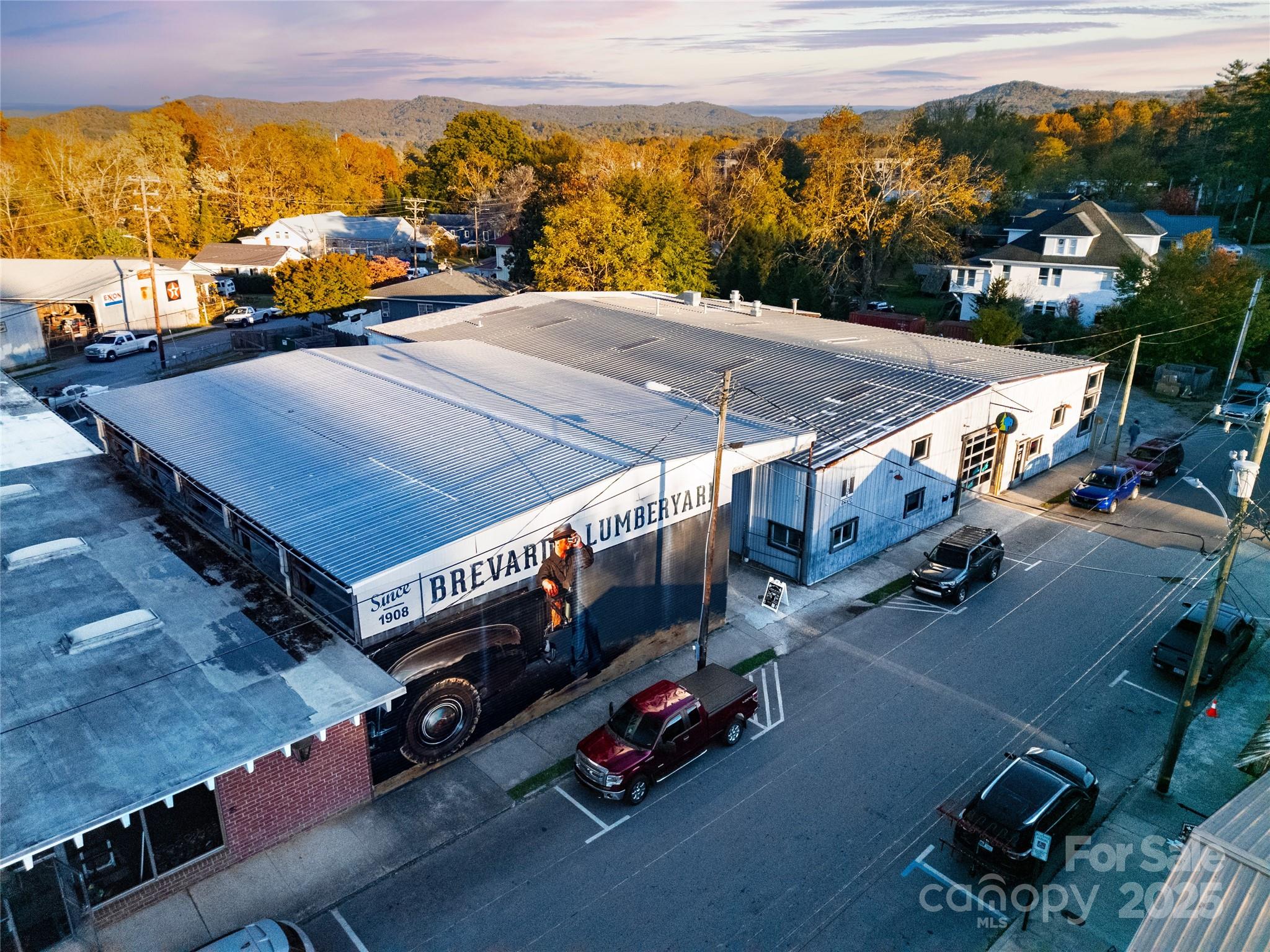 609 West Probart Street Brevard, NC 28712 - Photo 37 of 38 an aerial view of a tennis ground and a terrace view