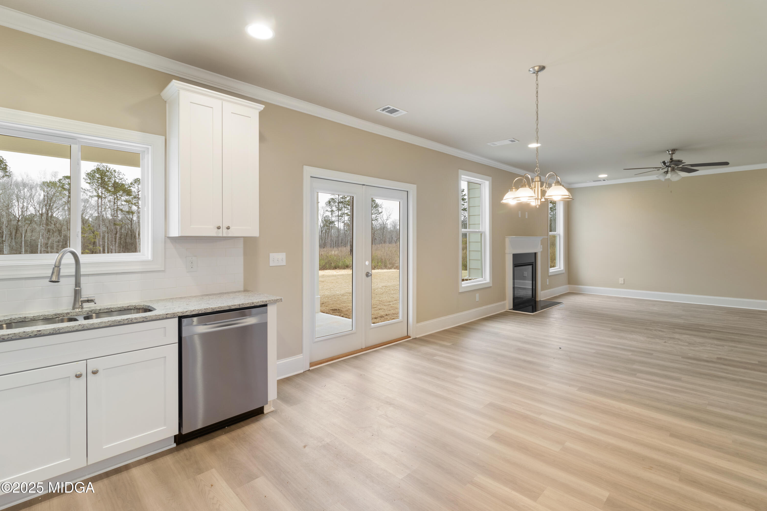 697 Giles Road Forsyth, GA 31029 - Photo 11 of 27 a view of a kitchen with a sink and a window