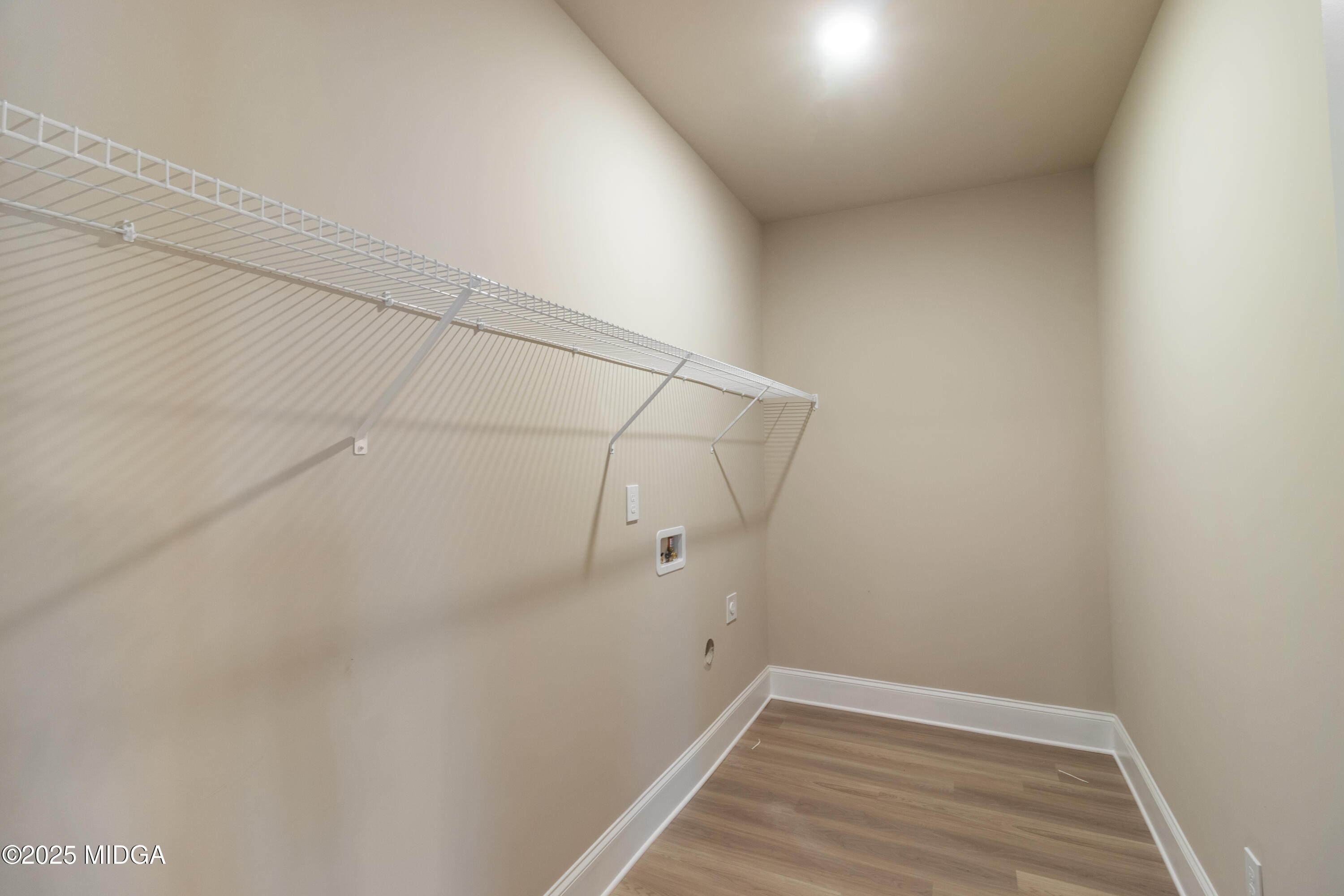697 Giles Road Forsyth, GA 31029 - Photo 13 of 27 a view of a room with an empty space