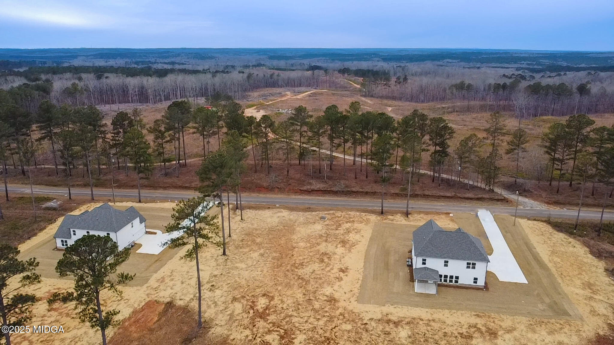 697 Giles Road Forsyth, GA 31029 - Photo 3 of 27 a view of a swimming pool with a lake view