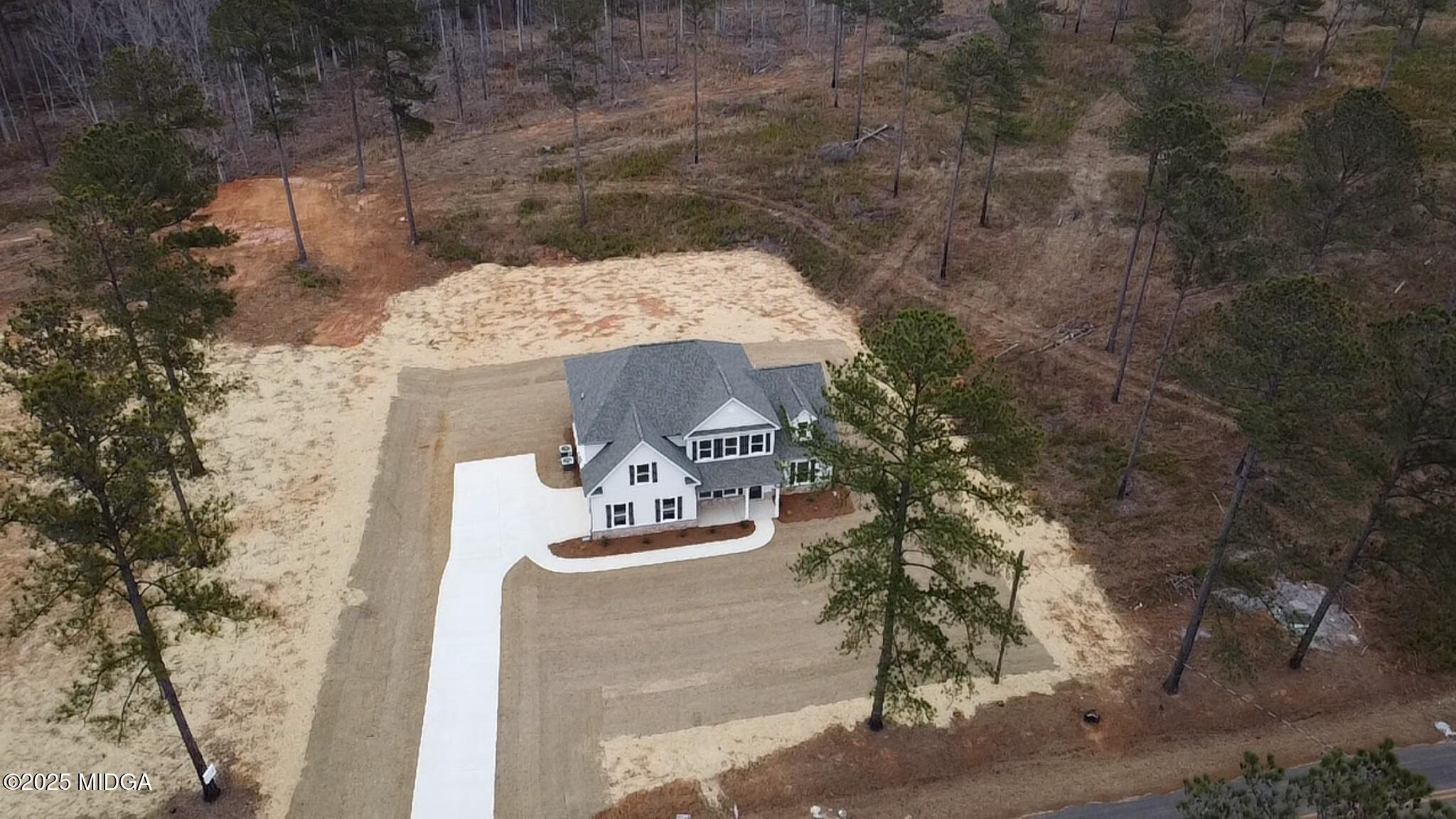697 Giles Road Forsyth, GA 31029 - Photo 4 of 27 a view of table and chairs in the patio