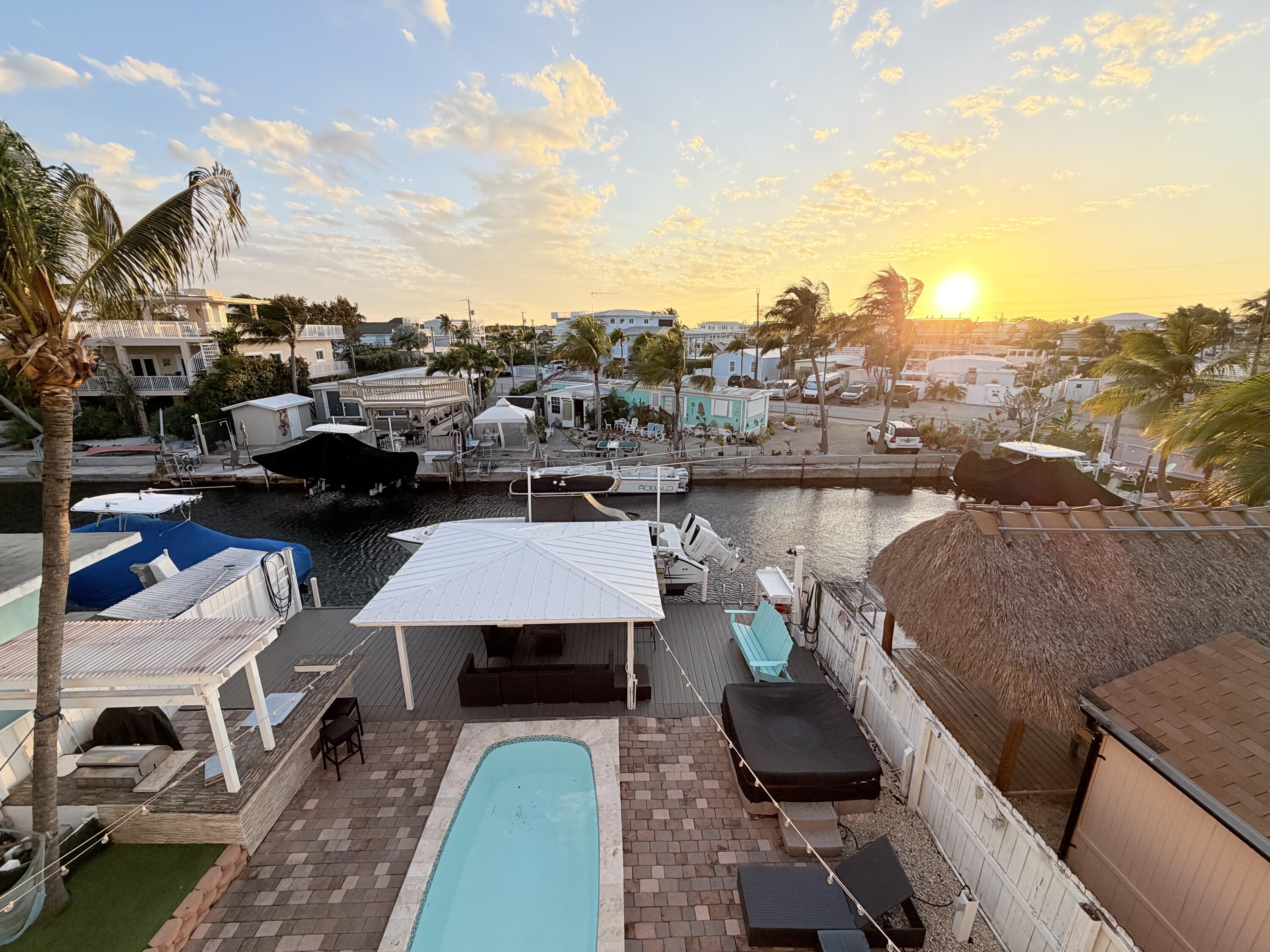 1313 Calder Road Key Largo, FL 33037 - Photo 48 of 72 3rd Floor Sunset View of Backyard