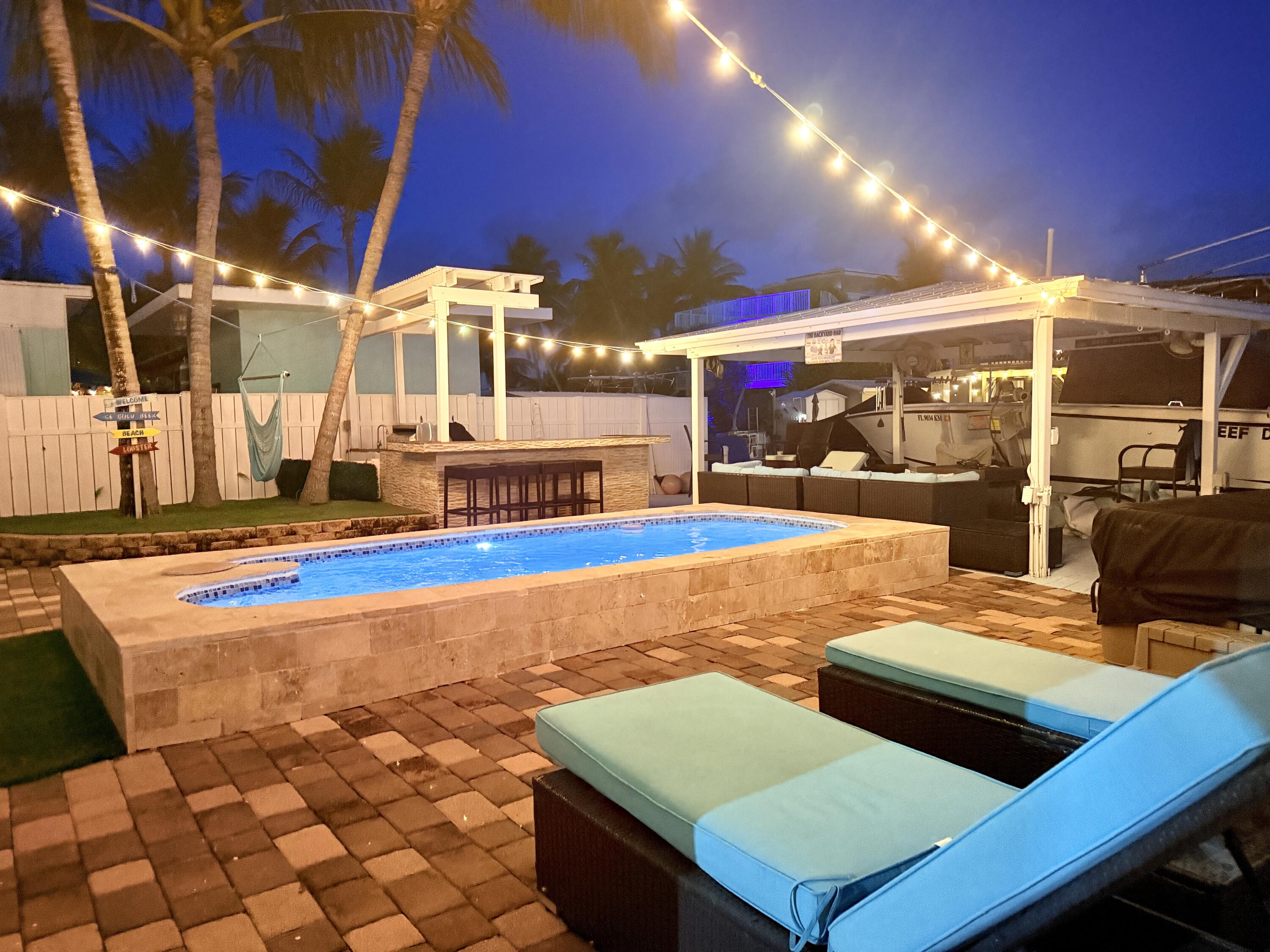 1313 Calder Road Key Largo, FL 33037 - Photo 7 of 81 Backyard Area at Night