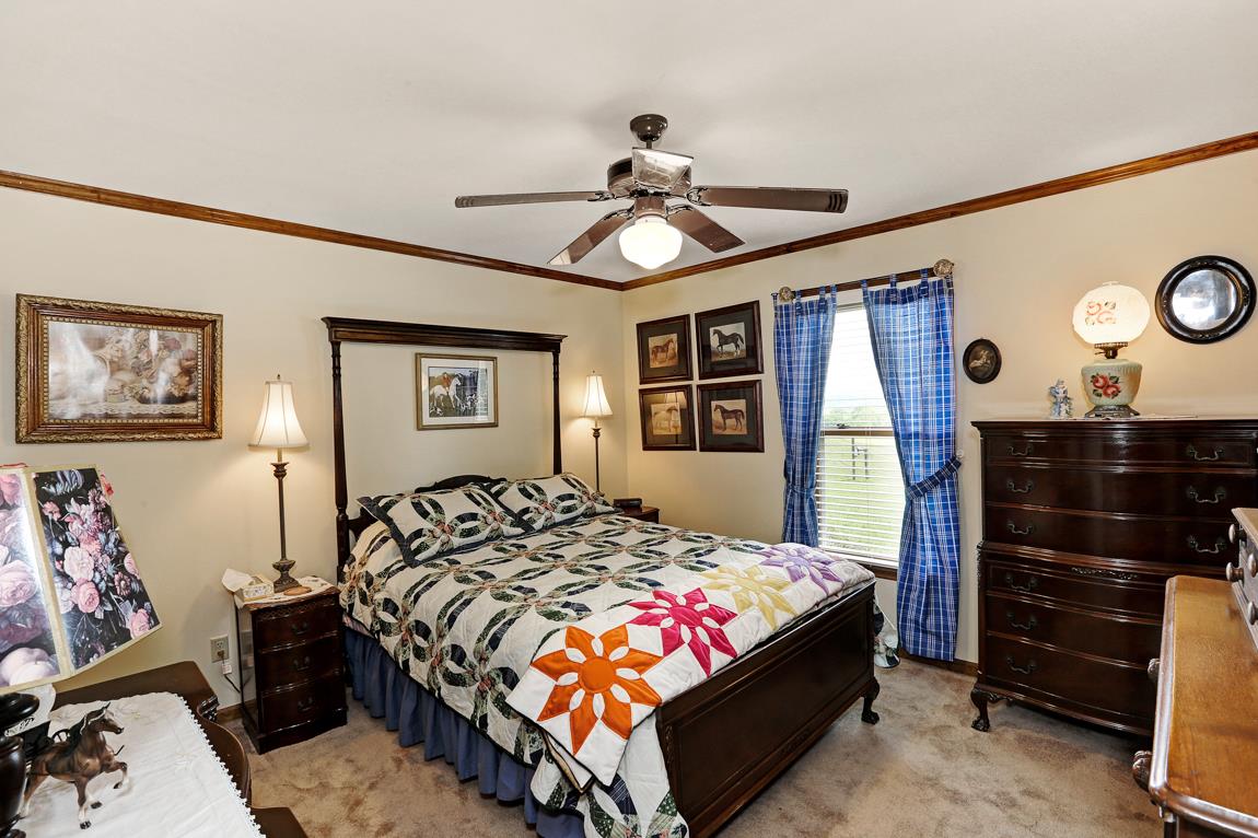 6536 Prospect Road Prospect, TN 38477 - Photo 14 of 30 a bedroom with bed and wooden floor