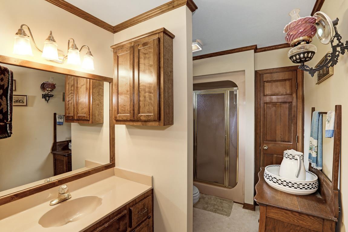 6536 Prospect Road Prospect, TN 38477 - Photo 16 of 30 a bathroom with a sink and a mirror