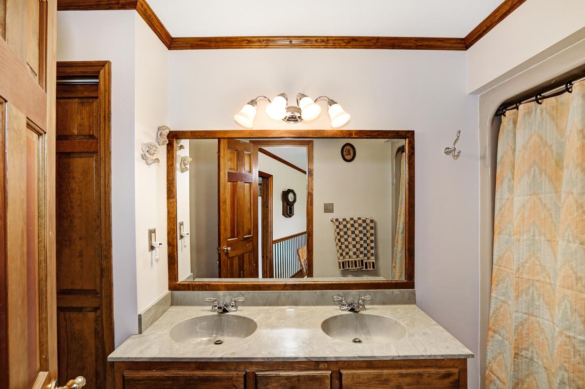 6536 Prospect Road Prospect, TN 38477 - Photo 18 of 30 a bathroom with a sink and a mirror