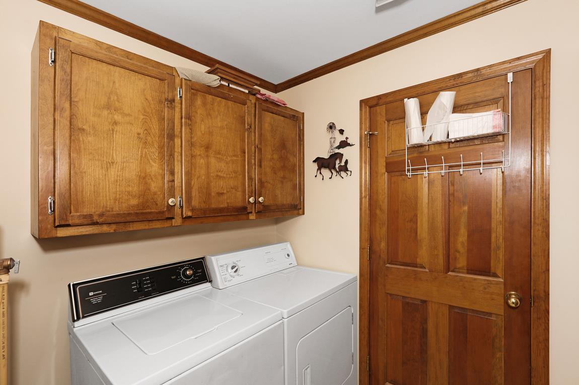 6536 Prospect Road Prospect, TN 38477 - Photo 19 of 30 a utility room with dryer and washer