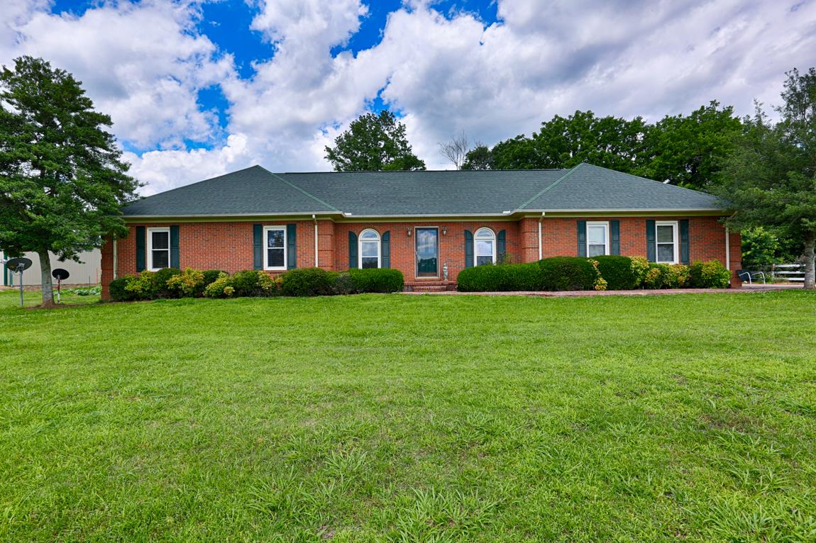 6536 Prospect Road Prospect, TN 38477 - Photo 3 of 30 a front view of house with yard and green space