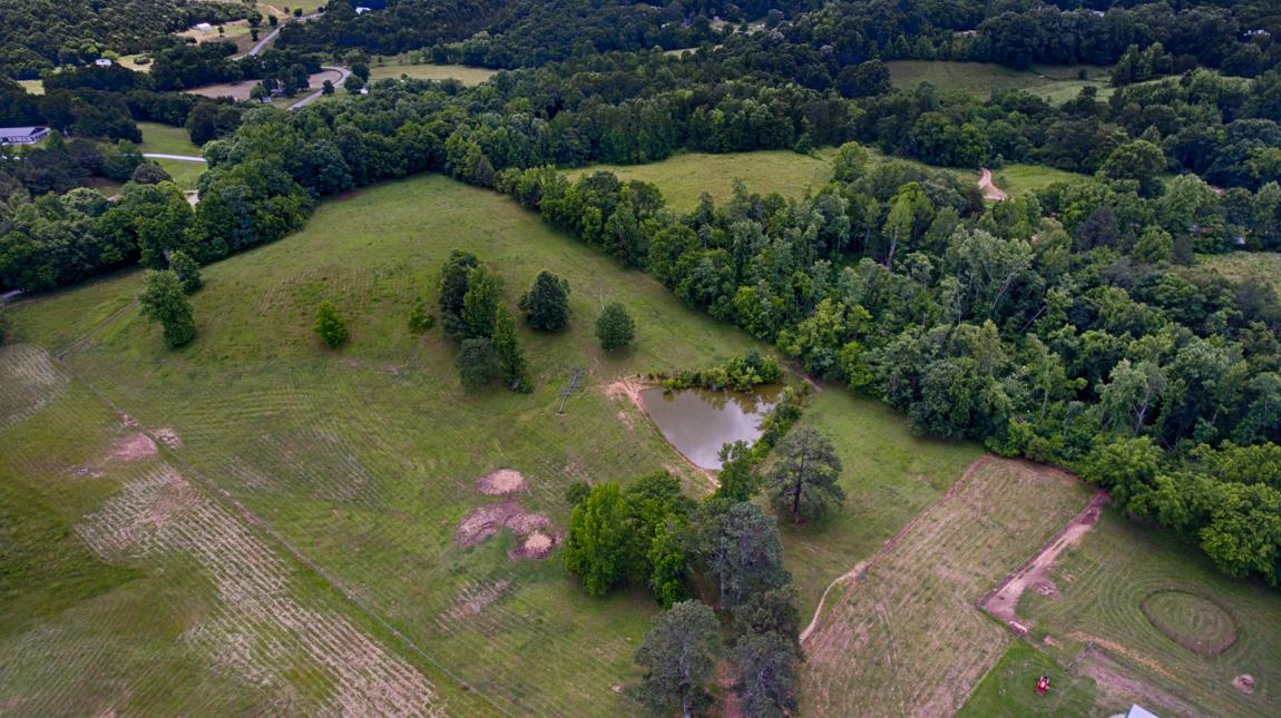 6536 Prospect Road Prospect, TN 38477 - Photo 30 of 30 an aerial view of a house with a yard