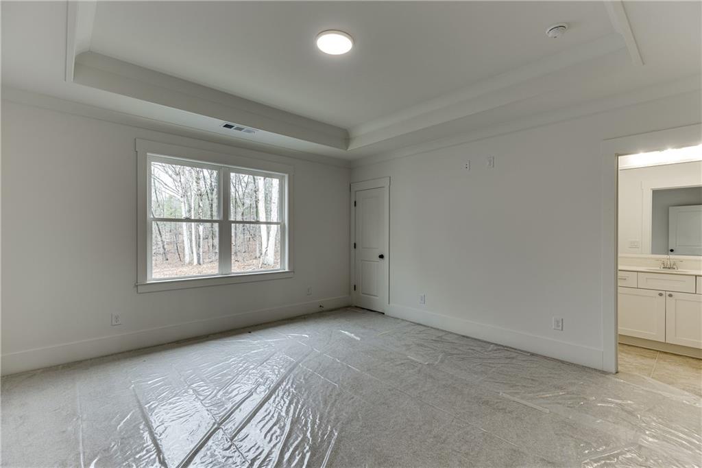 100 Gleneagles Way Pendergrass, GA 30567 - Photo 36 of 58 an empty room with windows