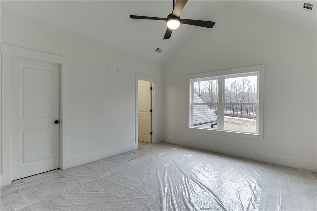 100 Gleneagles Way Pendergrass, GA 30567 - Photo 40 of 58 a view of an empty room with a window
