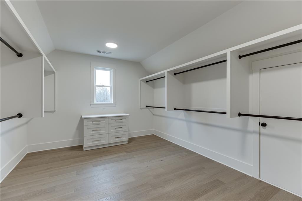 100 Gleneagles Way Pendergrass, GA 30567 - Photo 55 of 58 a view of an empty room with windows