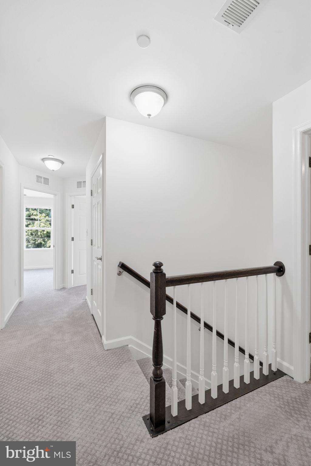 124 Riverside Drive Chester, MD 21619 - Photo 17 of 44 Bright and airy upstairs hallway