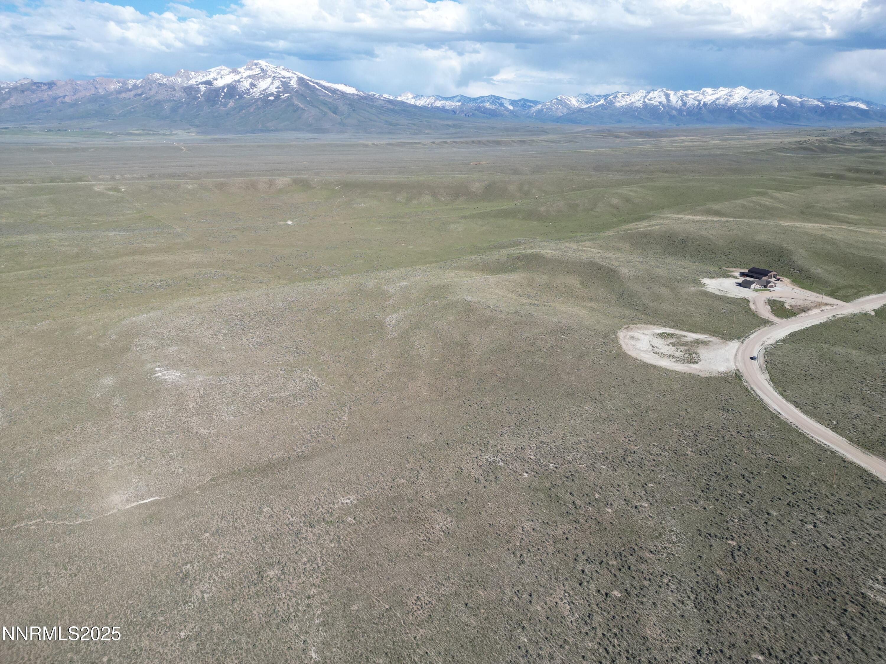 Lot Sun Sun Vly Road, Unit C9 Spring Creek, NV 89815 - Photo 2 of 11 a view of a lake with a mountain