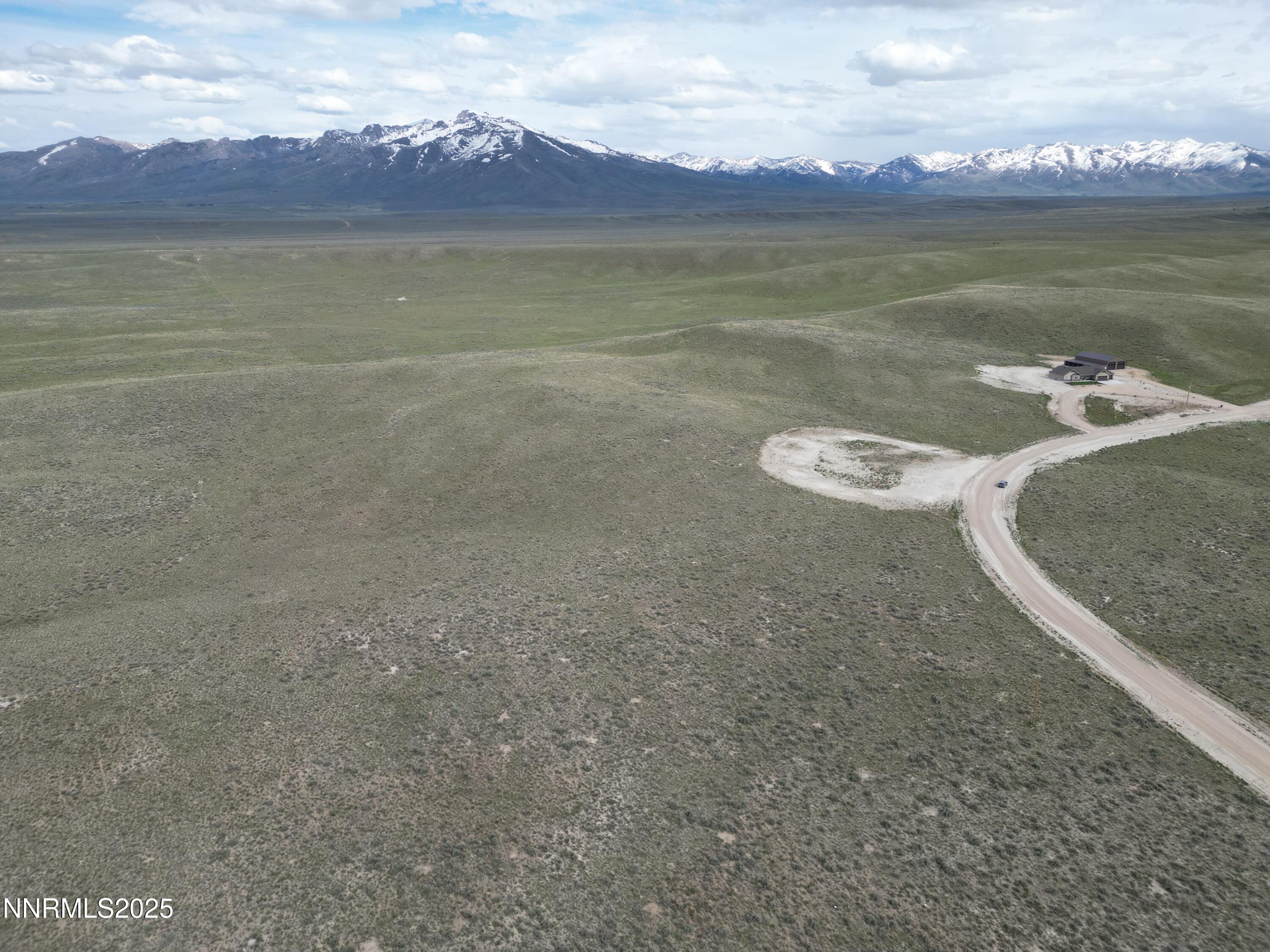 Lot Sun Sun Vly Road, Unit C9 Spring Creek, NV 89815 - Photo 6 of 11 a view of a lake with a mountain