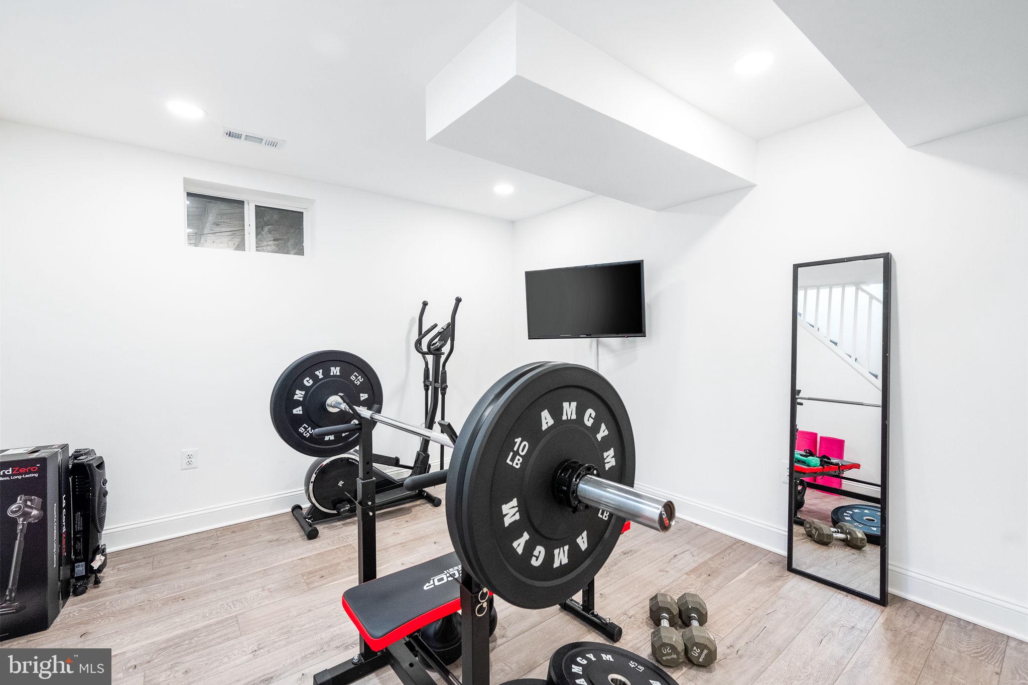 5020 River Road Bethesda, MD 20816 - Photo 28 of 36 a view of play room and wooden floor