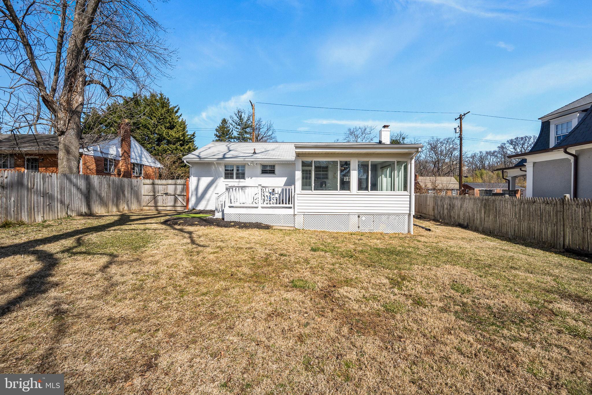 5020 River Road Bethesda, MD 20816 - Photo 35 of 36 a front view of a house with a yard