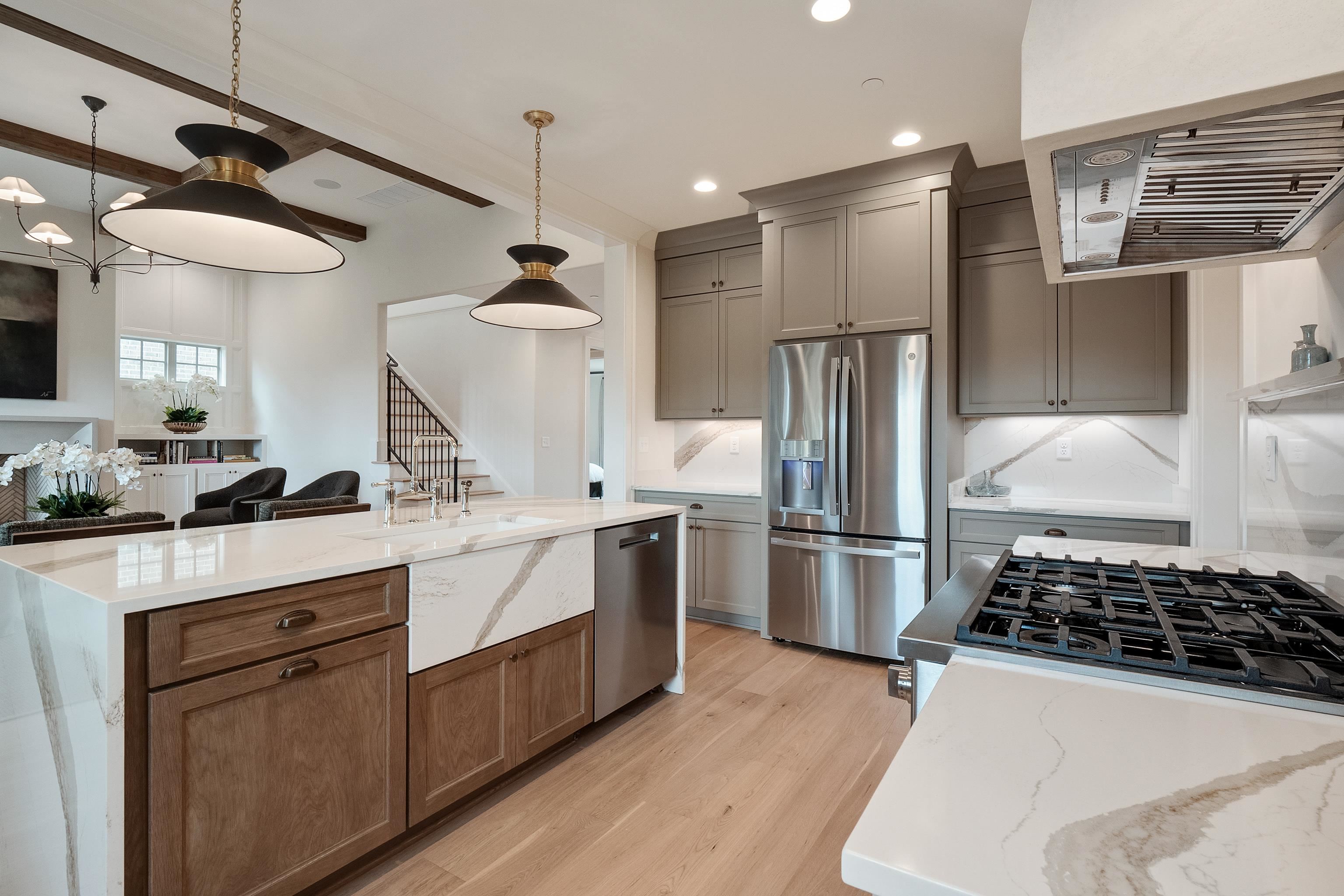 760 Cardinal Cove Collierville, TN 38017 - Photo 14 of 40 a kitchen with a refrigerator and a sink