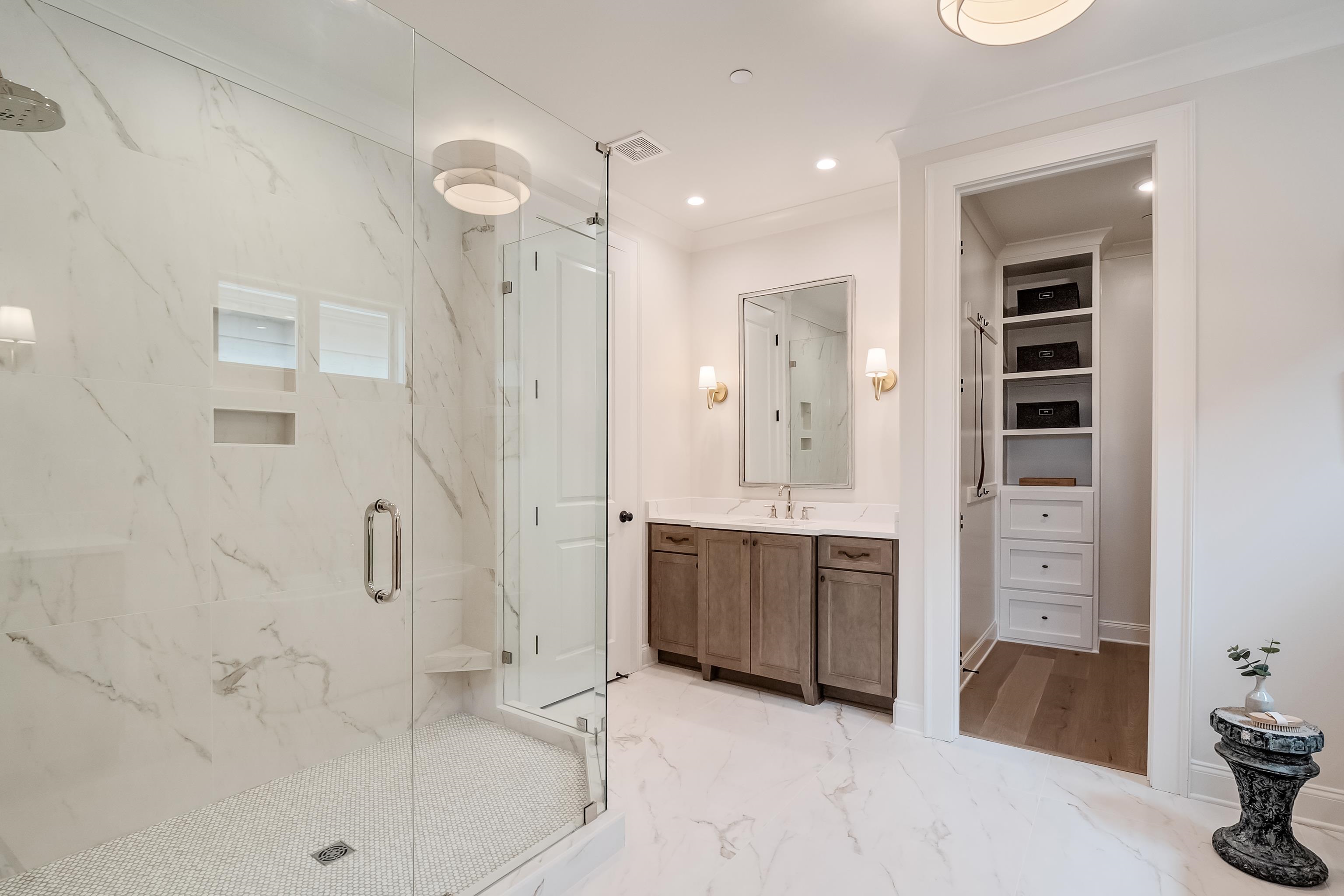 760 Cardinal Cove Collierville, TN 38017 - Photo 23 of 40 a bathroom with a tub shower and mirror