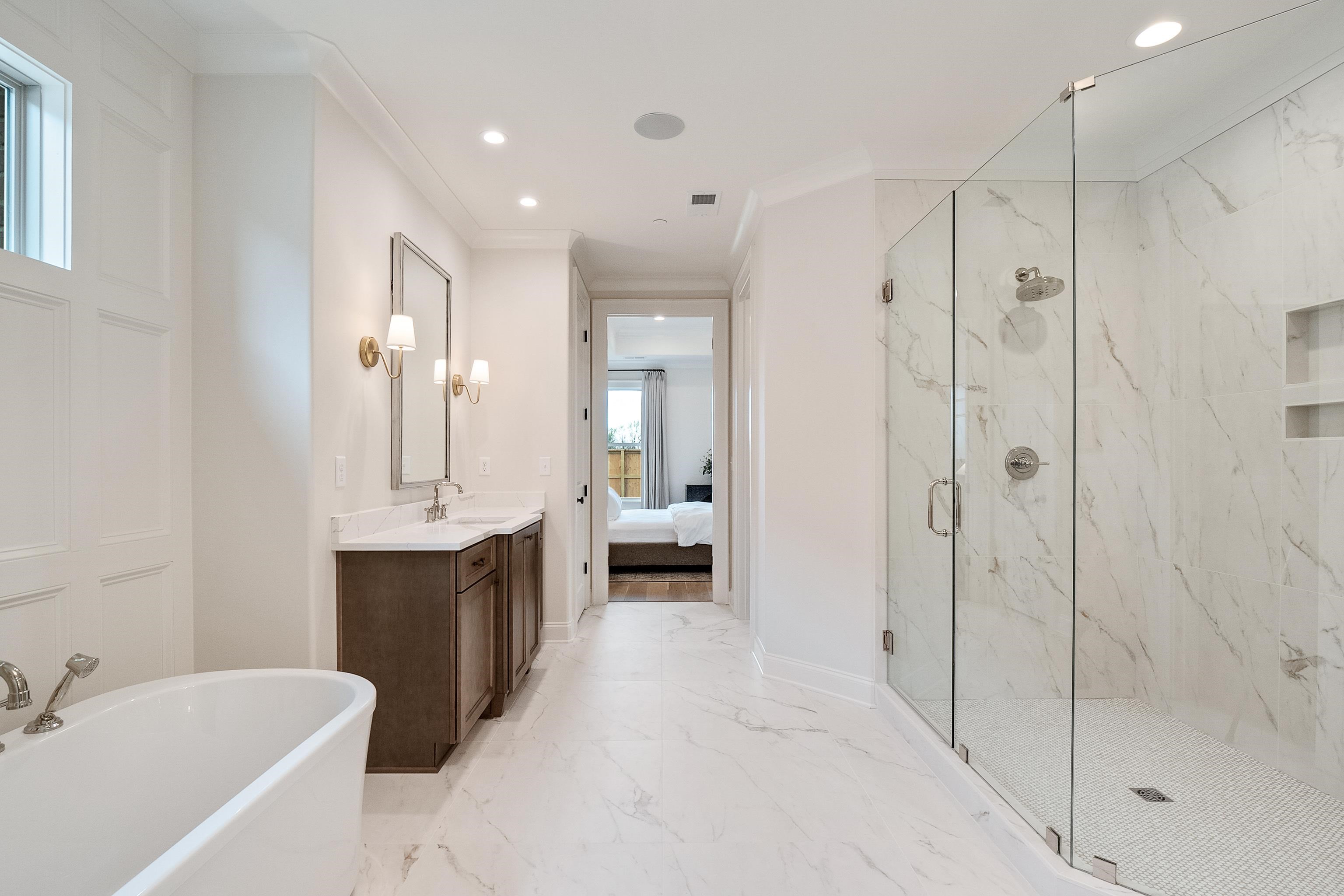 760 Cardinal Cove Collierville, TN 38017 - Photo 25 of 40 a bathroom with a double vanity sink mirror and shower