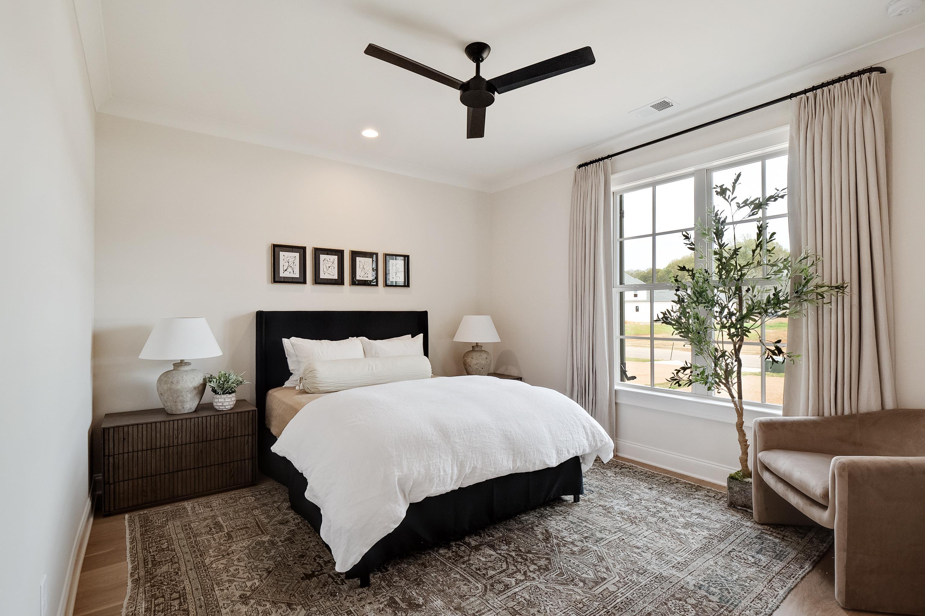 760 Cardinal Cove Collierville, TN 38017 - Photo 26 of 40 a bedroom with a large bed and a window