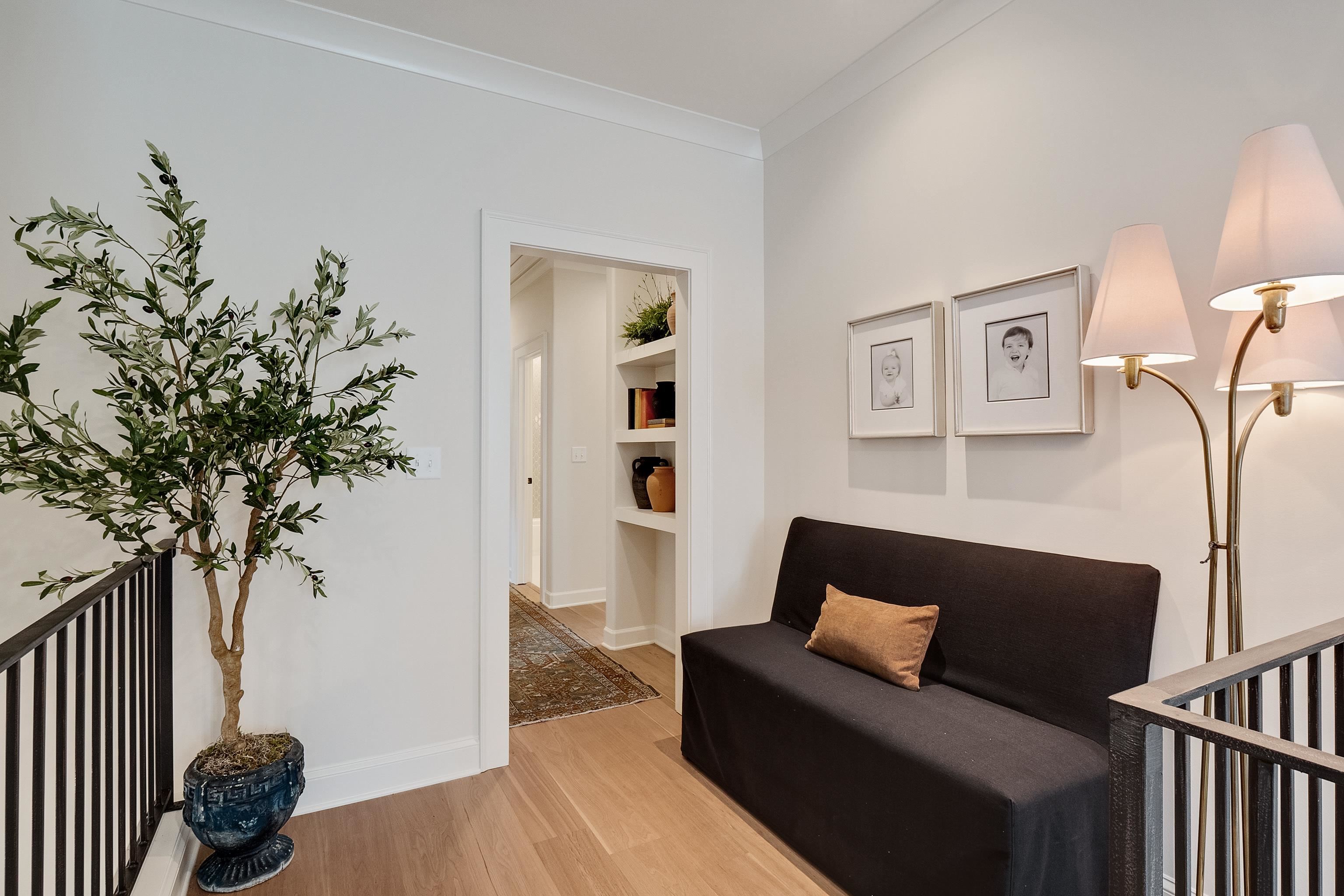 760 Cardinal Cove Collierville, TN 38017 - Photo 29 of 40 a living room with furniture and a potted plant