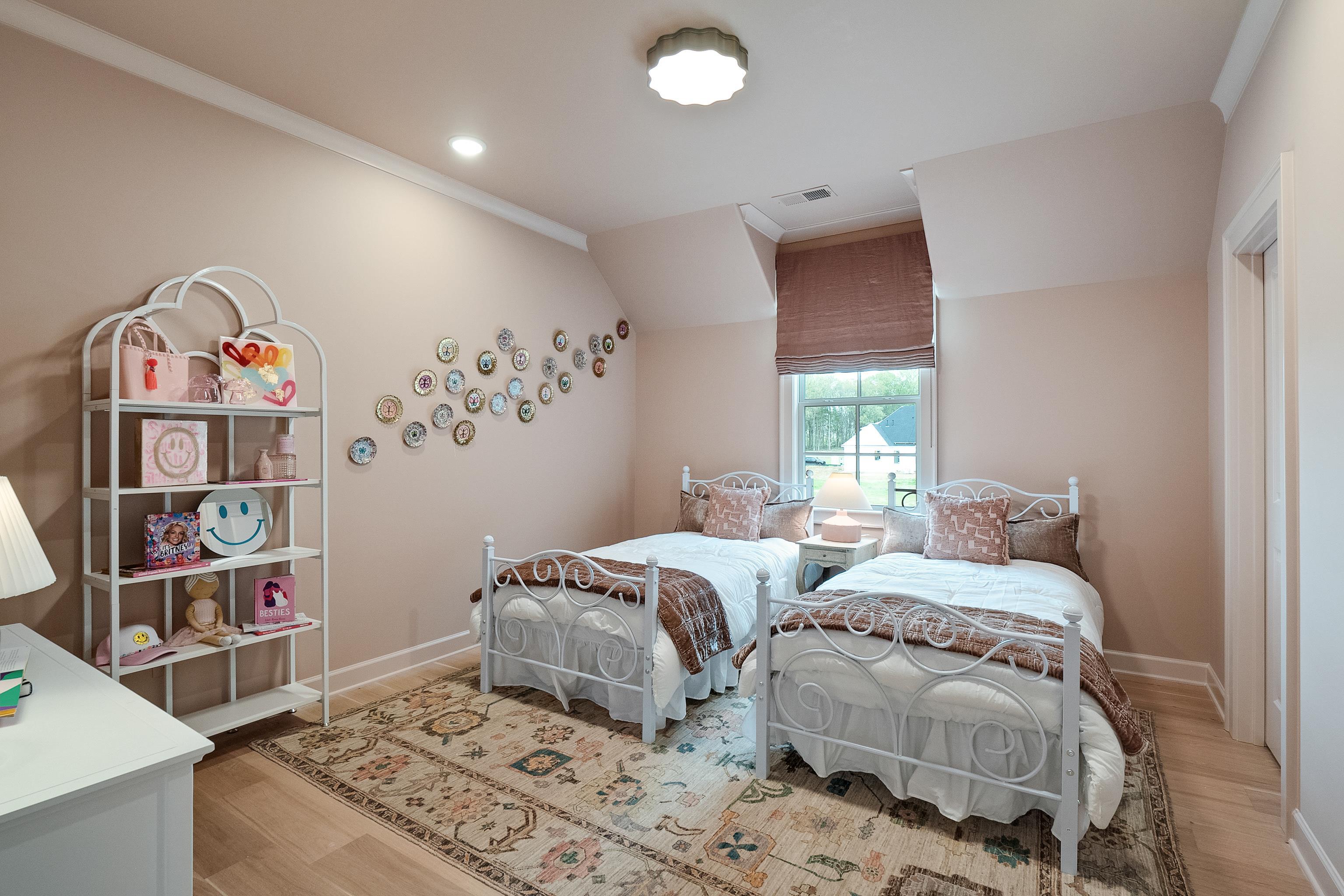 760 Cardinal Cove Collierville, TN 38017 - Photo 33 of 40 a bedroom with two beds and a window