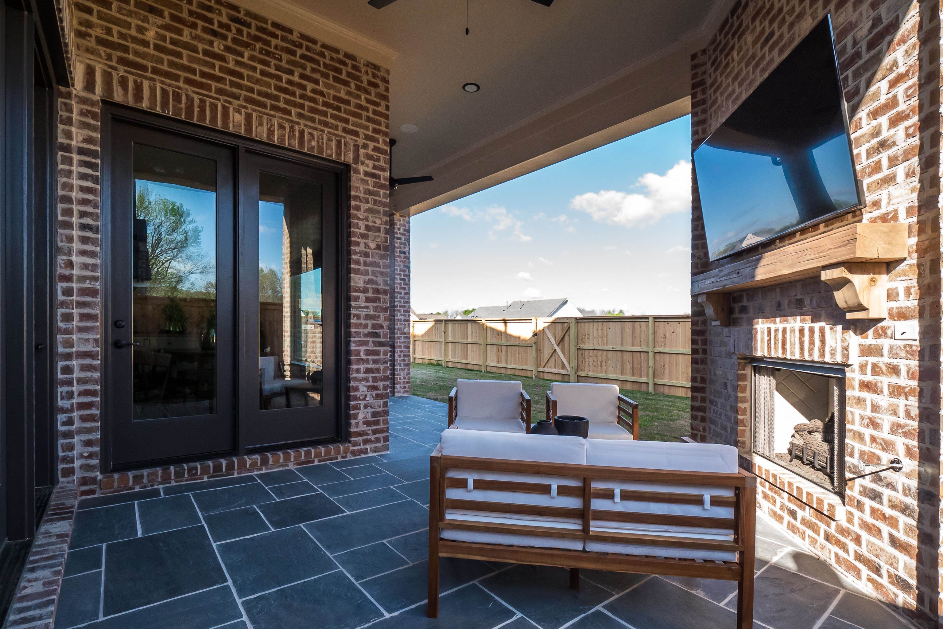 760 Cardinal Cove Collierville, TN 38017 - Photo 38 of 40 a view of a balcony with furniture and floor to ceiling window