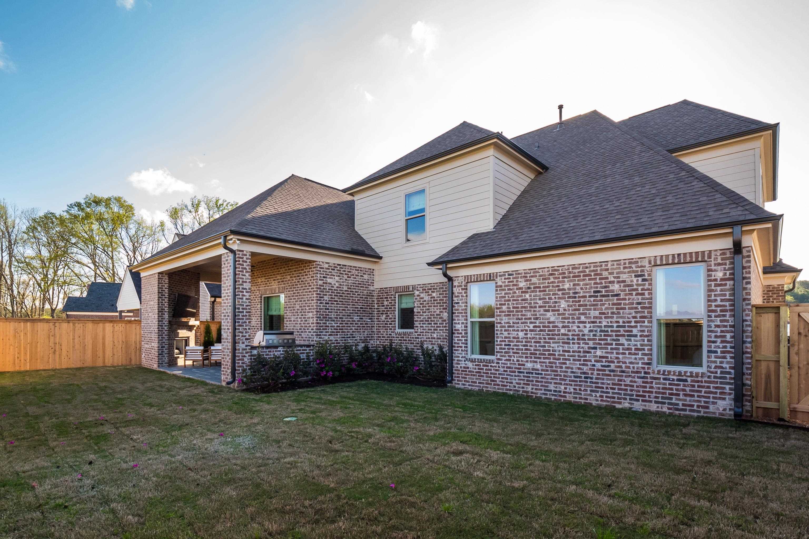 760 Cardinal Cove Collierville, TN 38017 - Photo 39 of 40 a view of a house with a back yard