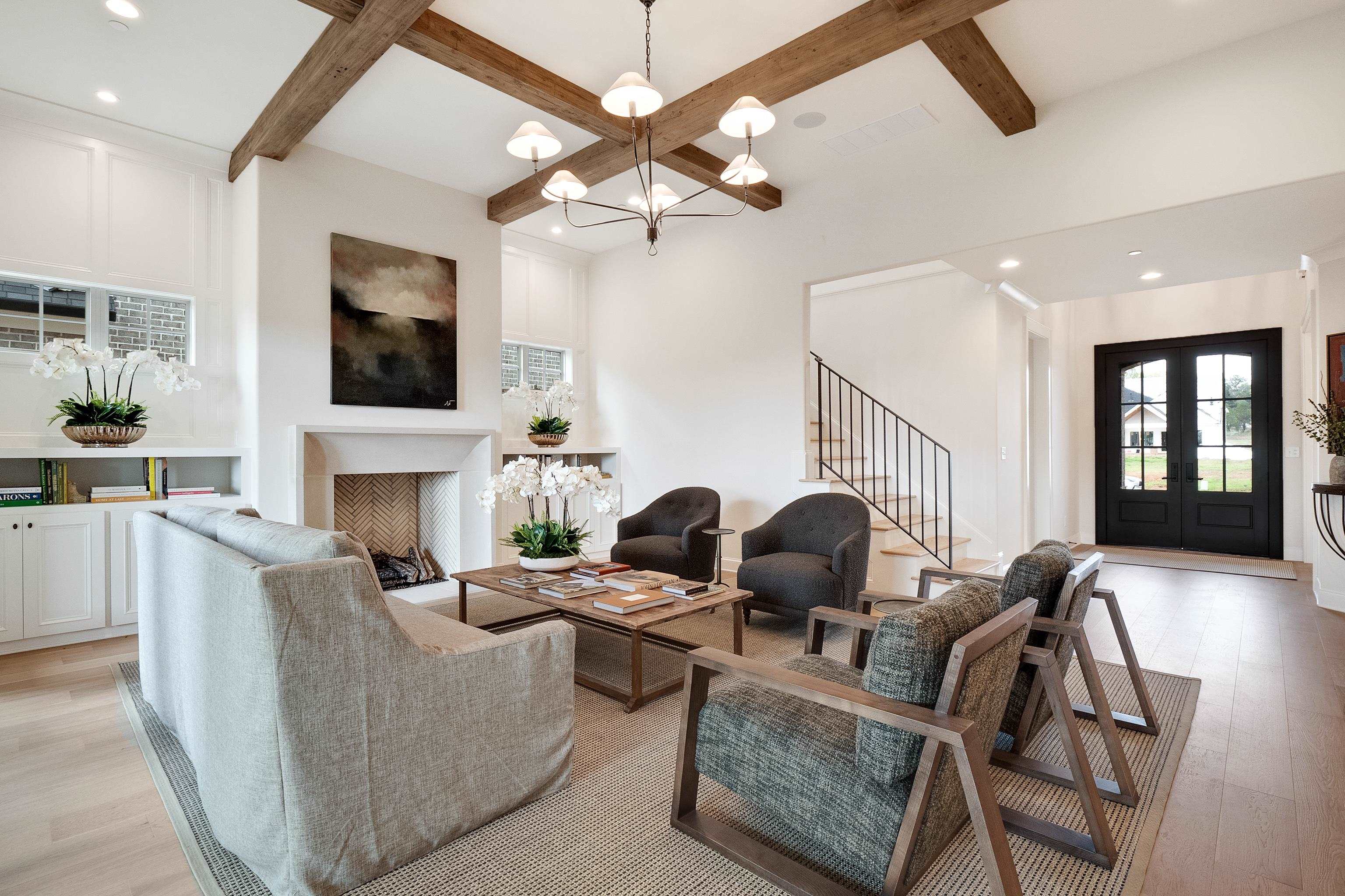 760 Cardinal Cove Collierville, TN 38017 - Photo 7 of 40 a living room with fireplace furniture and a flat screen tv