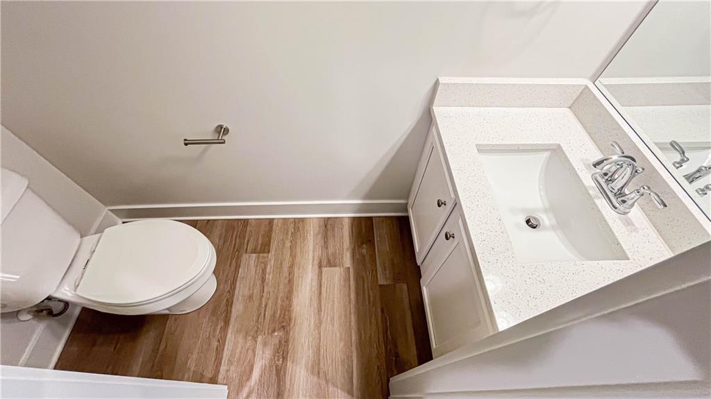 740 Eudora Welty Way Athens, GA 30607 - Photo 22 of 57 a bathroom with a toilet a sink and a mirror